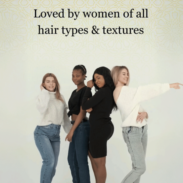 Four women with different hair types and textures pose together, smiling and confident. Their radiant looks reflect the benefits of a Z Secrets organic hair care routine. Text above reads, “Loved by women of all hair types & textures.”
